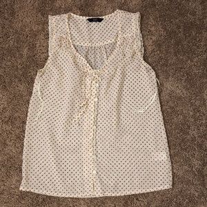 Summer sleeveless blouse top in creamish white